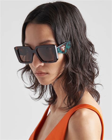 Turquoise Lenses Sunglasses With Prada Logo 